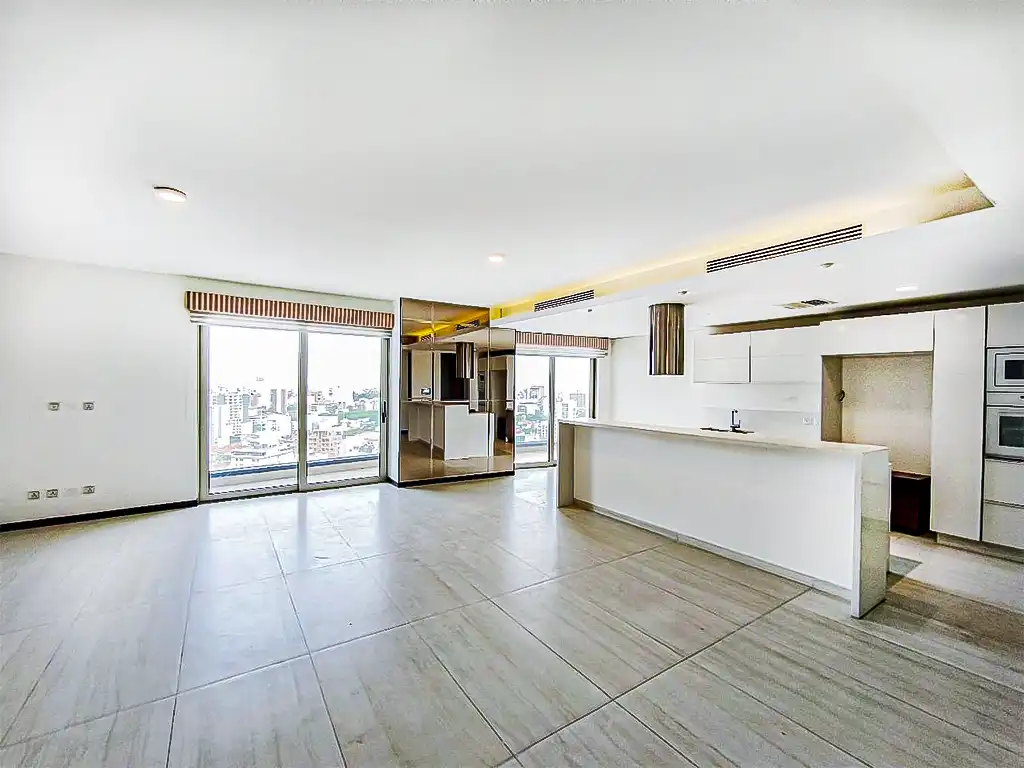 amplio_dpto_en_venta_con_terraza_jacuzzi_en_cond_Rivera_beauty_plaza_equipetrol_sala_y_cocina